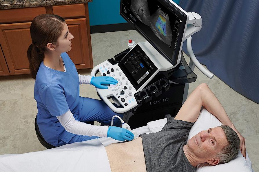 Doctor performing an abdominal ultrasound exam