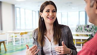 A woman is talking to a medical professional