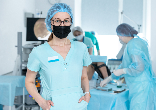 A nurse standing in an OR.